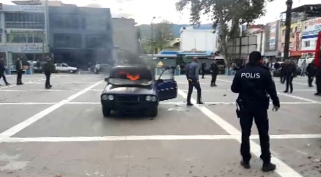 Aracını ateşe verip kendini yakmak istedi