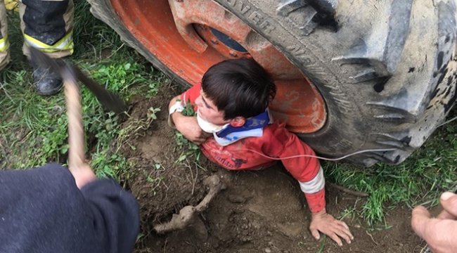 Traktörün altında kaldı