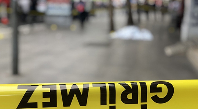 Eşi ve çocuğunun gözü önünde kurşuna dizildi
