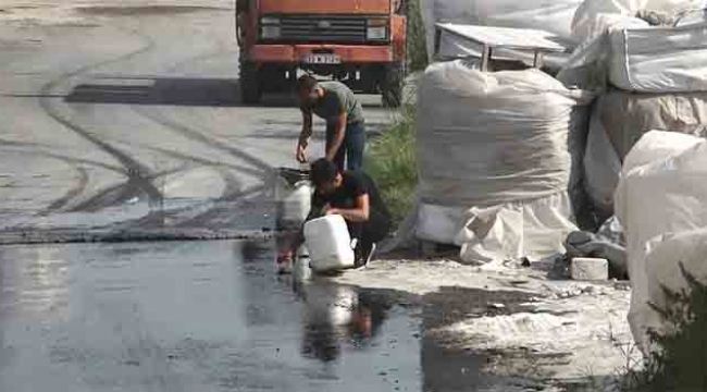 Tanker devrildi sızan mazotu bidonlara doldurdular
