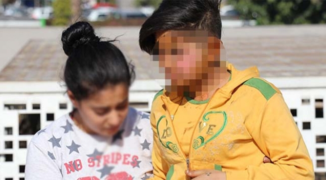 Genç kızı üzerine benzin döküp yaktı