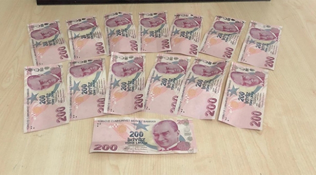 Esnafa sahte para verdi yakalandı
