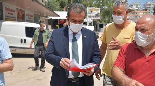 Çetin, yağmur mağduru esnafı ziyaret etti