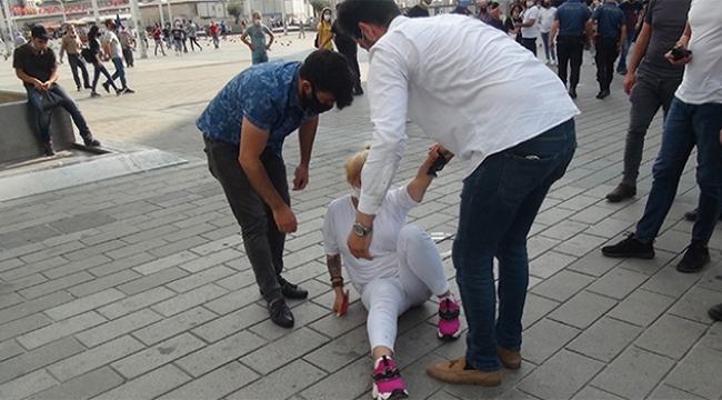 2 erkek bir kadını darp etti