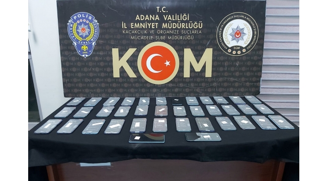 Peynir tenekesinden kaçak cep telefonu çıktı