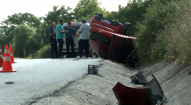Virajı alamayan otomobil takla attı