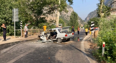 Yanan otomobilden son anda kurtarıldı