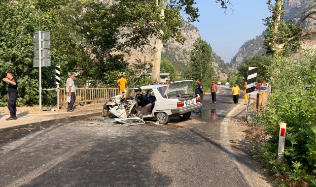 Yanan otomobilden son anda kurtarıldı