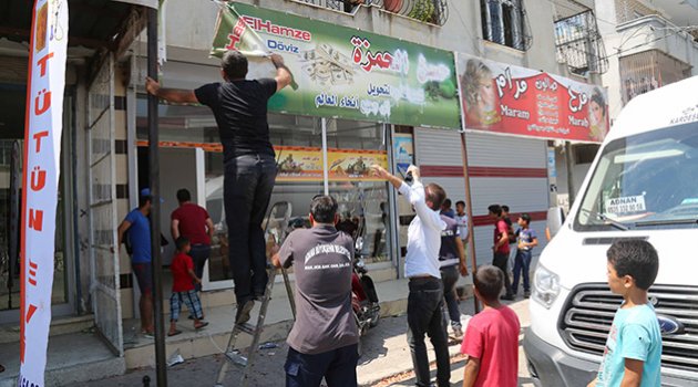 Arapça tabela, poster ve afişler kaldırıldı