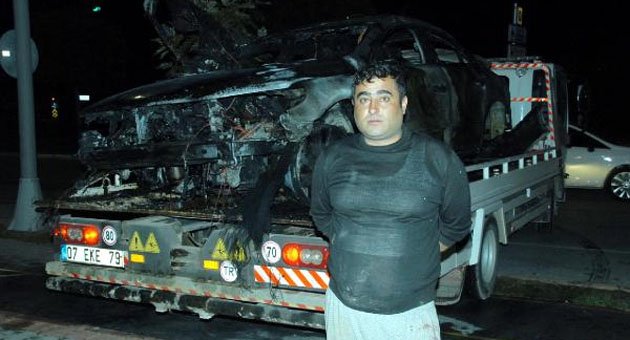 Bahçesine giren otomobilin sürücüsünü yanmaktan kurtardı