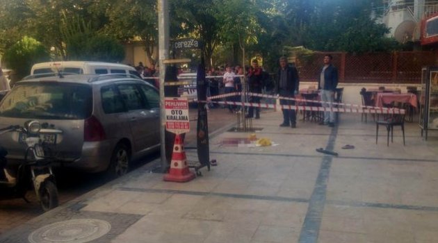 Boşandığı eşini sokak ortasında öldürdü