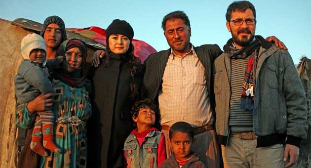 Çadırlarda kalan suriyelilere 1 kamyon dolusu eşya yardımı