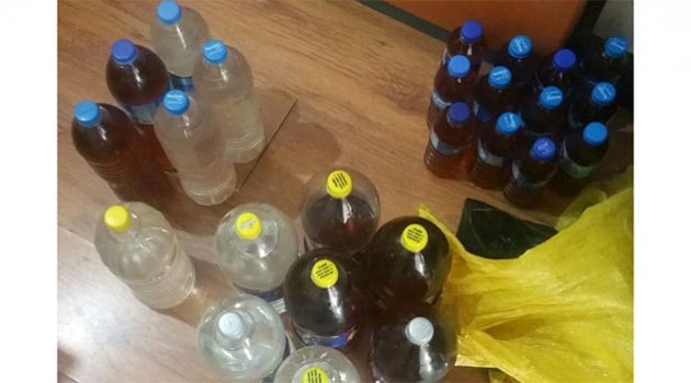 İş yerinde 30 litre  sahte  içki  ele geçirildi