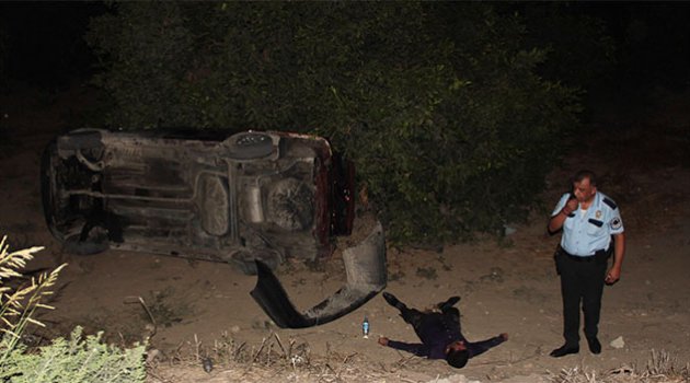 Otomobil portakal bahçesine uçtu