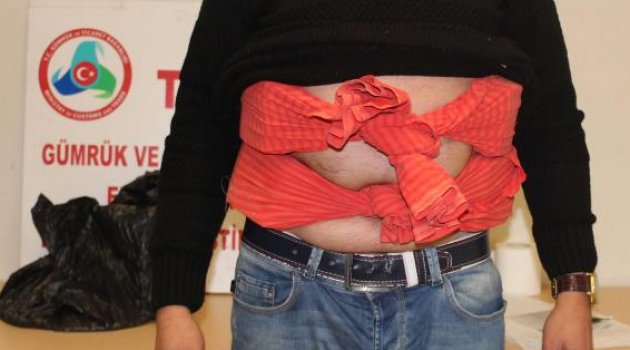 Vücuduna sarılı 1260 kalaşnikof mermisi ile yakalandı